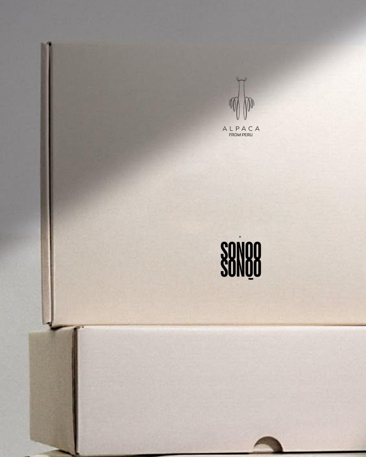Beige product box with 'SONOO' branding on a gray background